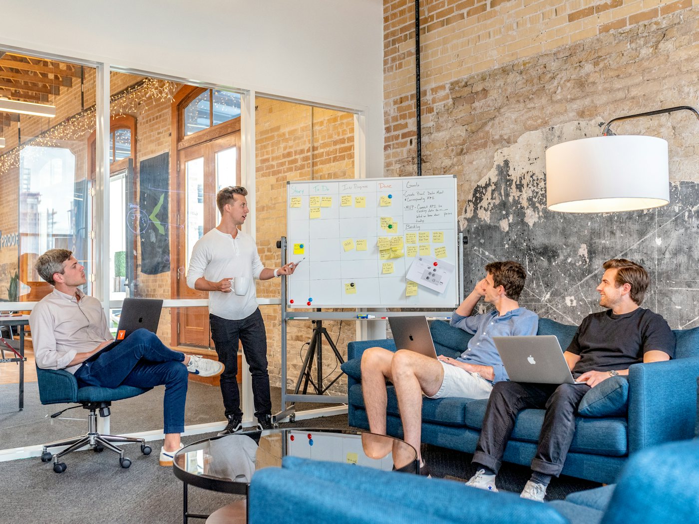 A team planning a product launch at a whiteboard
